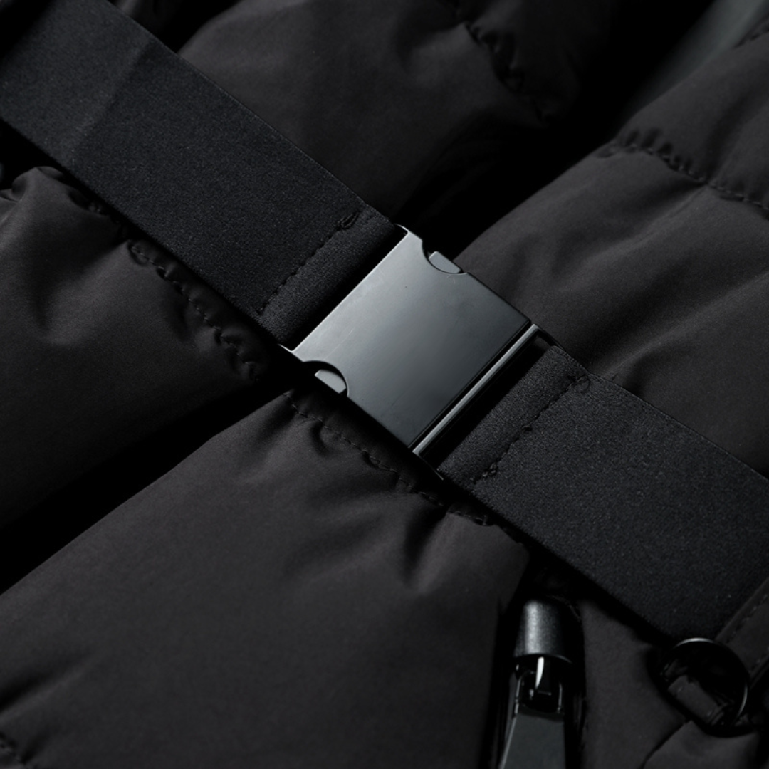 Clara dames pufferjas – zwarte gewatteerde jas met riem & waterafstotende afwerking