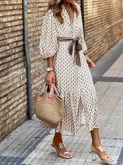 Isabella Jurk | Doorknoopjurk met Strikdetail, Subtiel Patroon en Elegante Pasvorm